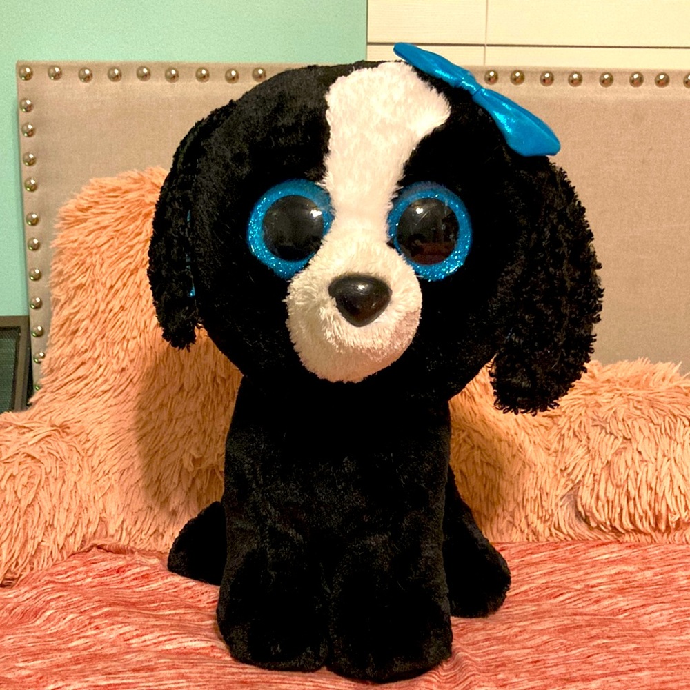 Beanie boo dog, black and blue, about 16 inches tall and about 6 inches wide.